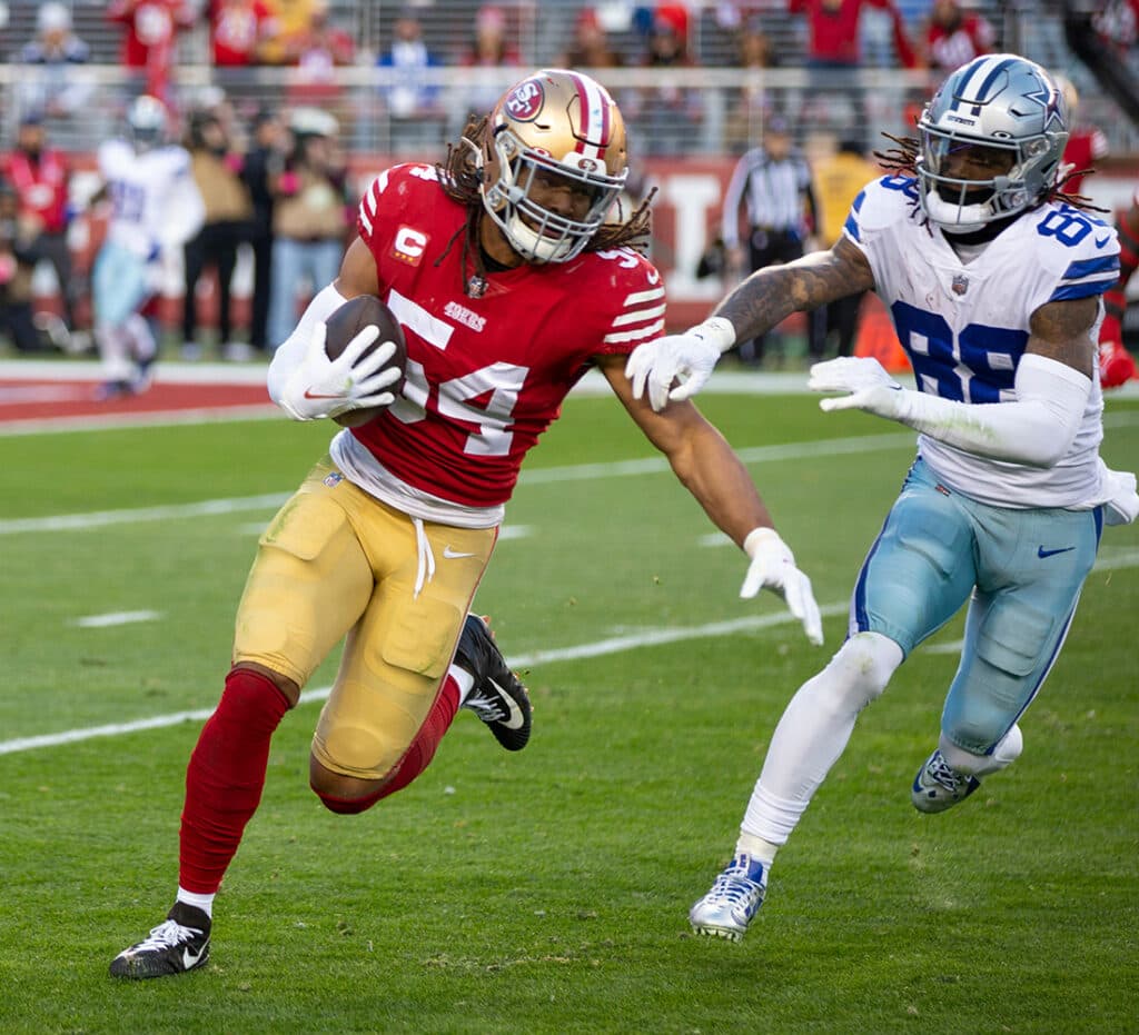 SANTA CLARA, CA - JANUARY 22: Fred Warner #54 of the San Francisco 49ers returns an interception during the NFC Divisional playoff game against the Dallas Cowboys at Levi's Stadium on January 22, 2023 in Santa Clara, California. The 49ers defeated the Cowboys 19-12. (Photo by Michael Zagaris/San Francisco 49ers/Getty Images)