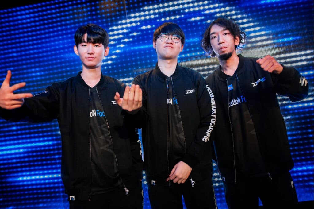 DFM's mid, jungle and top lane at Worlds 2023 - image via Colin Young-Wolff/Riot Games